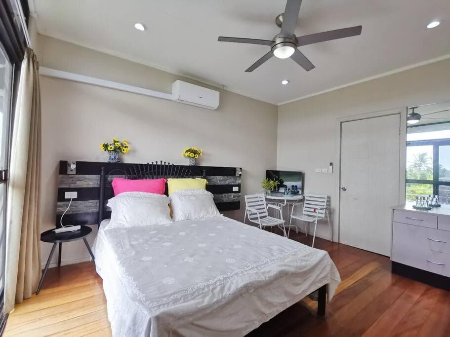 Master Bedroom in Shared Cozy River View Pool Apartment property photograph