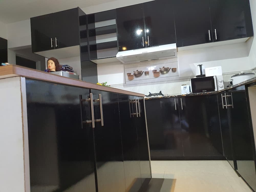 Master Bedroom with Shared Kitchen property photograph