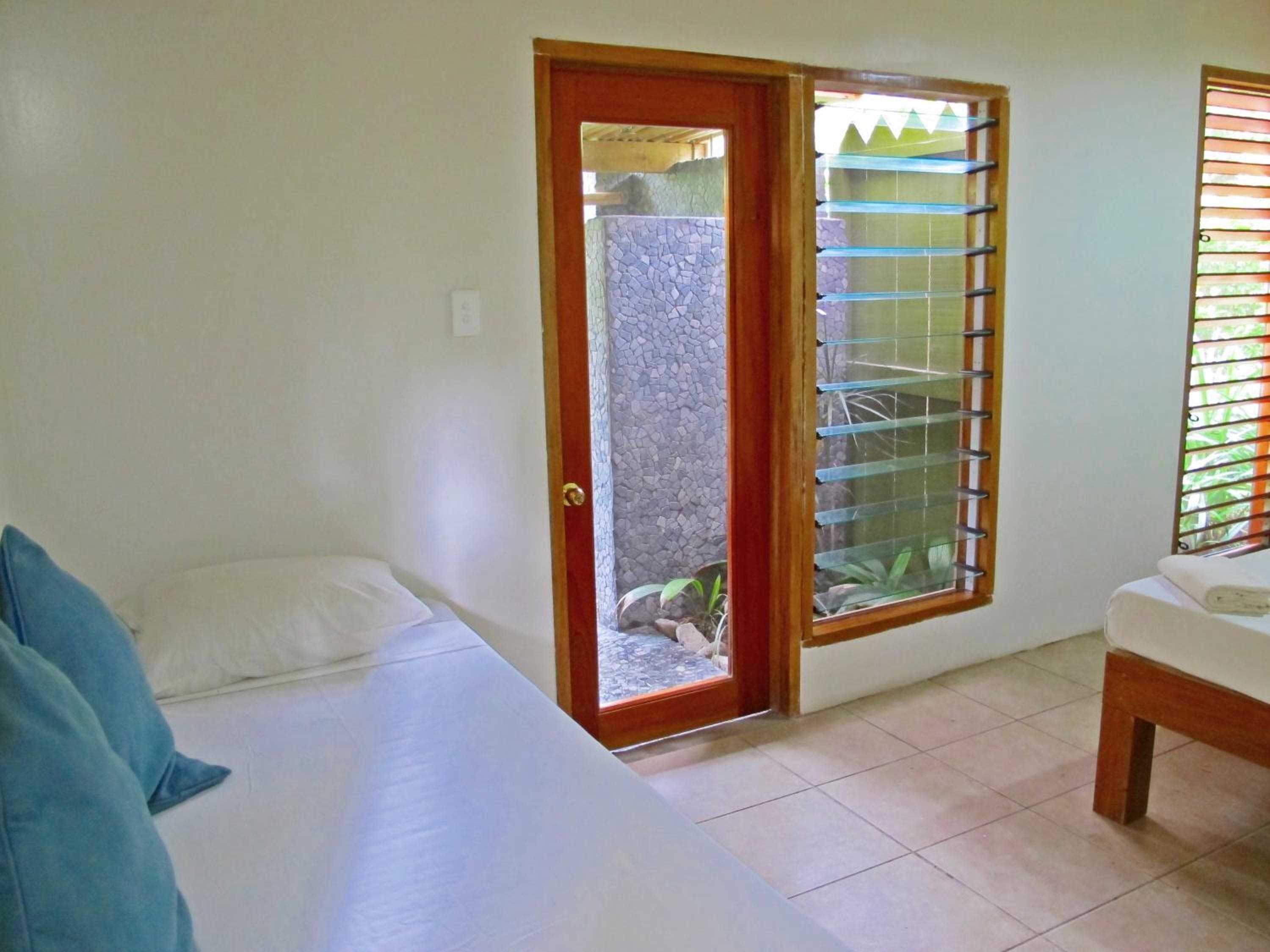 Double Room - Frangipani at Beachouse Resort