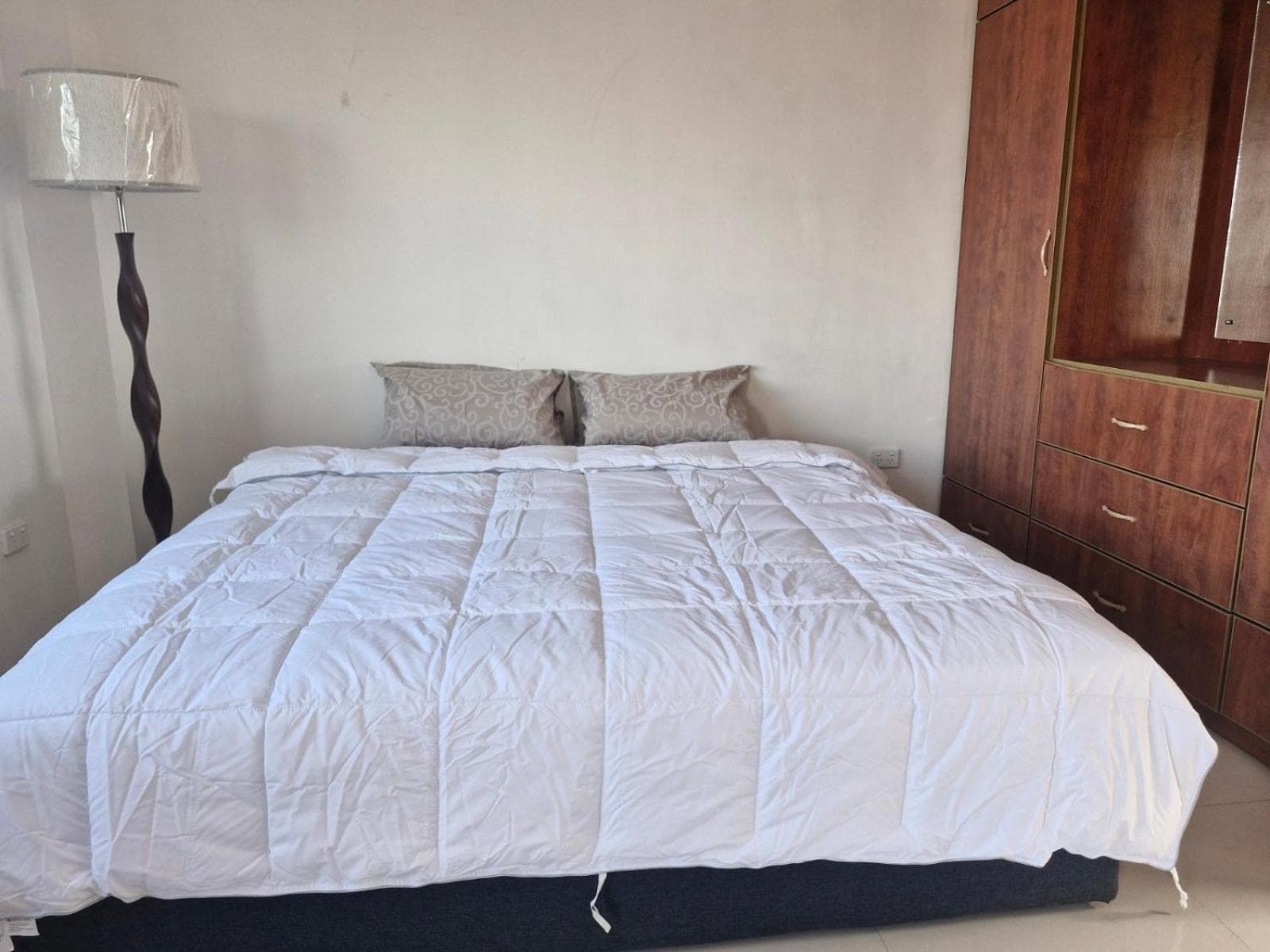 Classic One-Bedroom Apartment With King Bed at Affinity Central Apartments