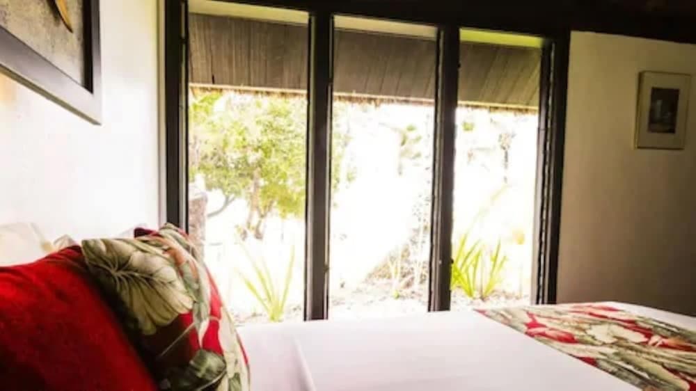 Beachfront Bure (1 Double and 2 Single Bed) at Tambua Sands Beach Resort - Adults Only