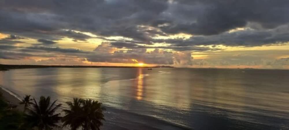 Sunset Suite with Beachfront Balcony at Smugglers Cove Beach Resort and Hotel