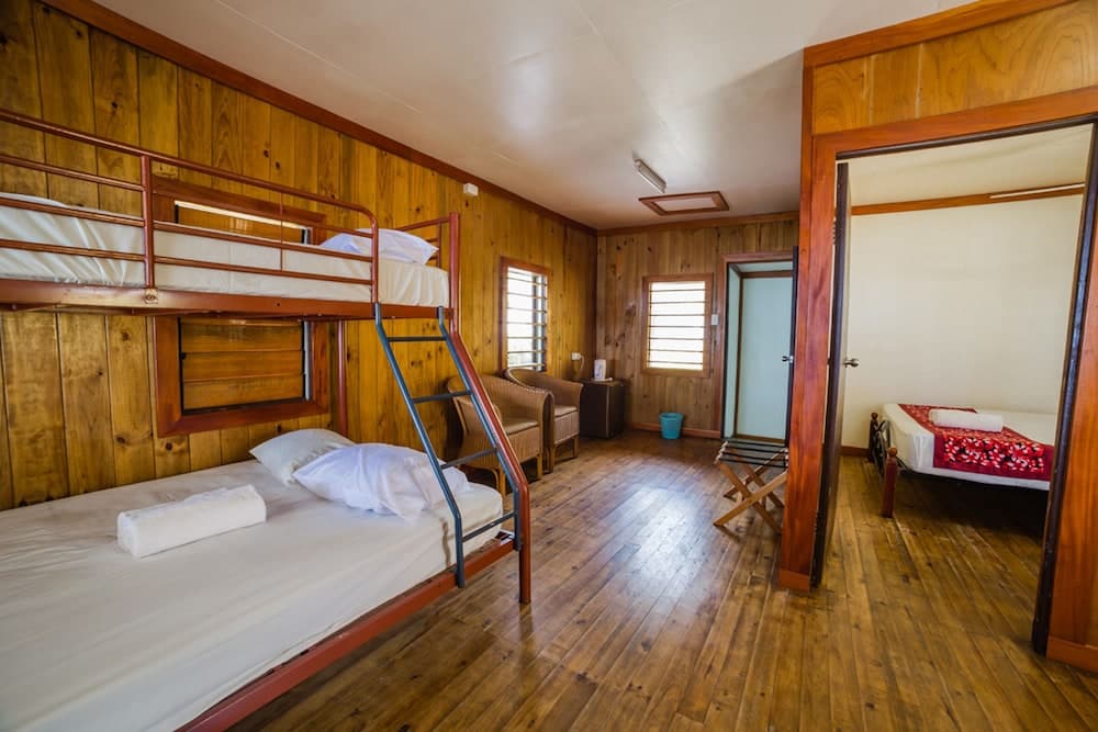 Beach Front Family Room at Ratu Kini Backpackers & Dive Resort