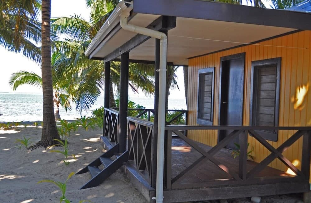Beach Front Cottage, One Double Bed at Ratu Kini Backpackers & Dive Resort
