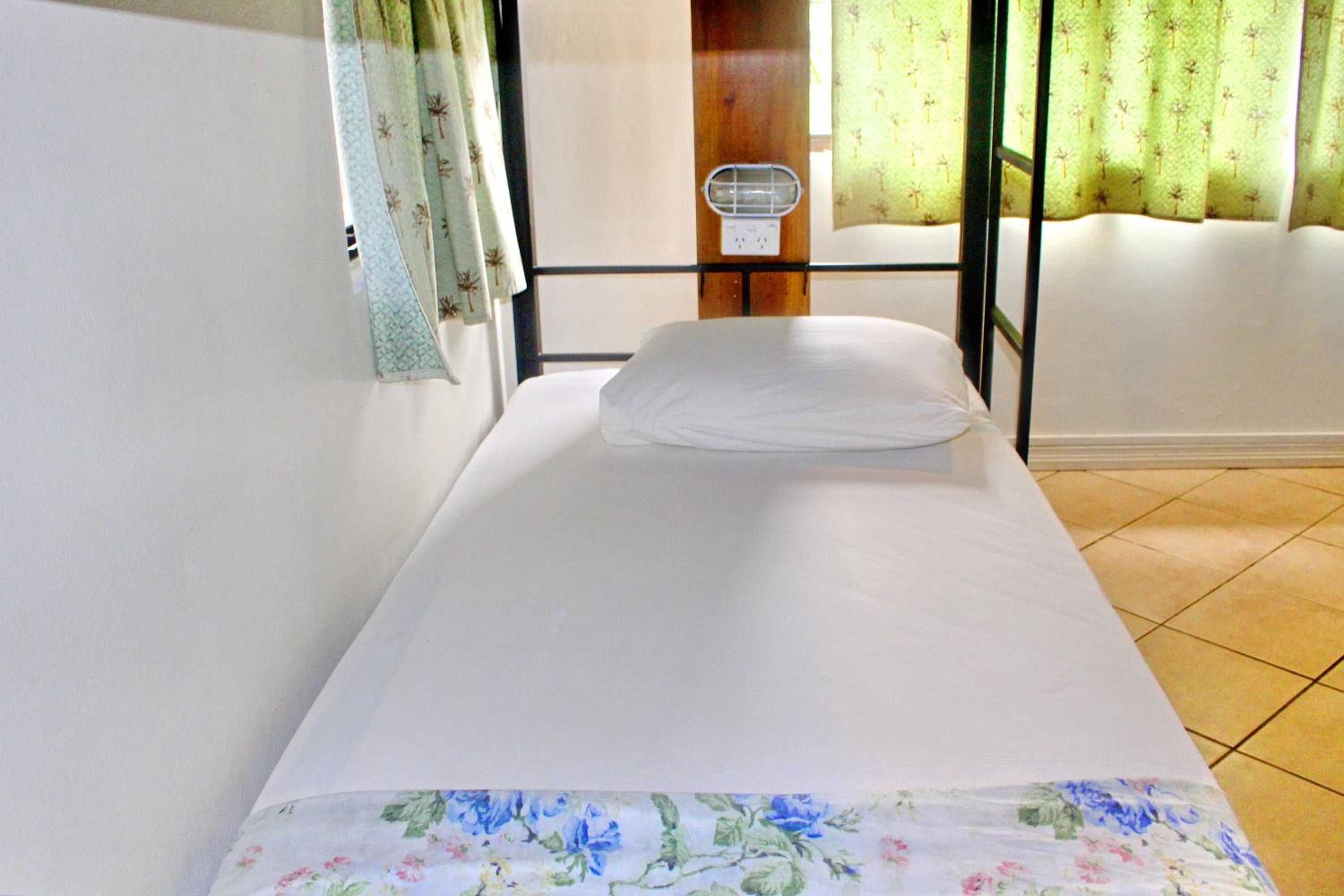 Bed in 4-Bed Mixed Dormitory Room at Bluewater Lodge